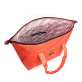 coral red large and lightweight recycled weekender. made from ocean-bound plastic.