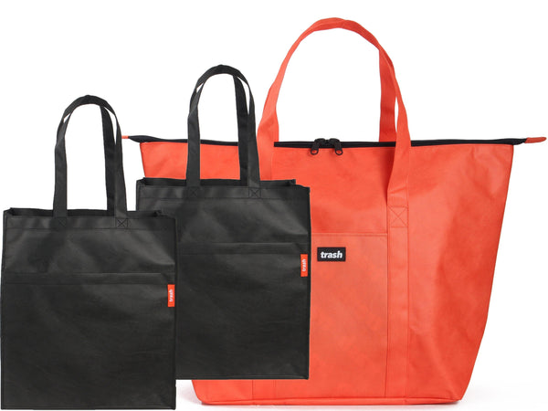 Red Recycled Weekender Bag and two black recycled large Tote bags
